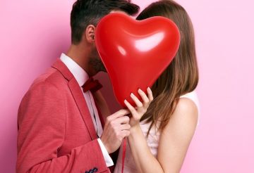 couple with heart balloon